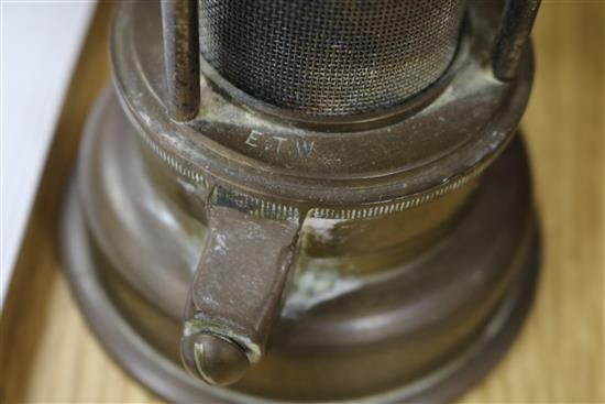 Two miners lamps and a bicycle lamp